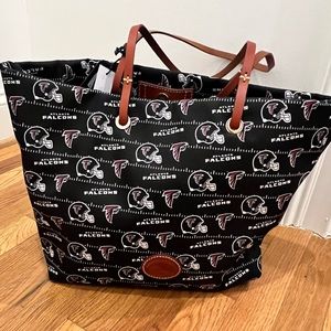 Brand new Dooney & Bourne NFL Falcons tote with smaller enclosure bag inside